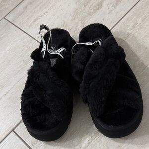 UGG Black Faux-Fur Crossband Slingback Mules..size 9
New ..authentic